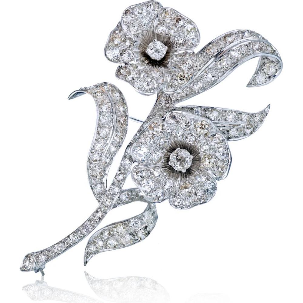 Platinum Flower Brooch with Moving Diamond Heads and Approximately 20 Carats of Diamonds