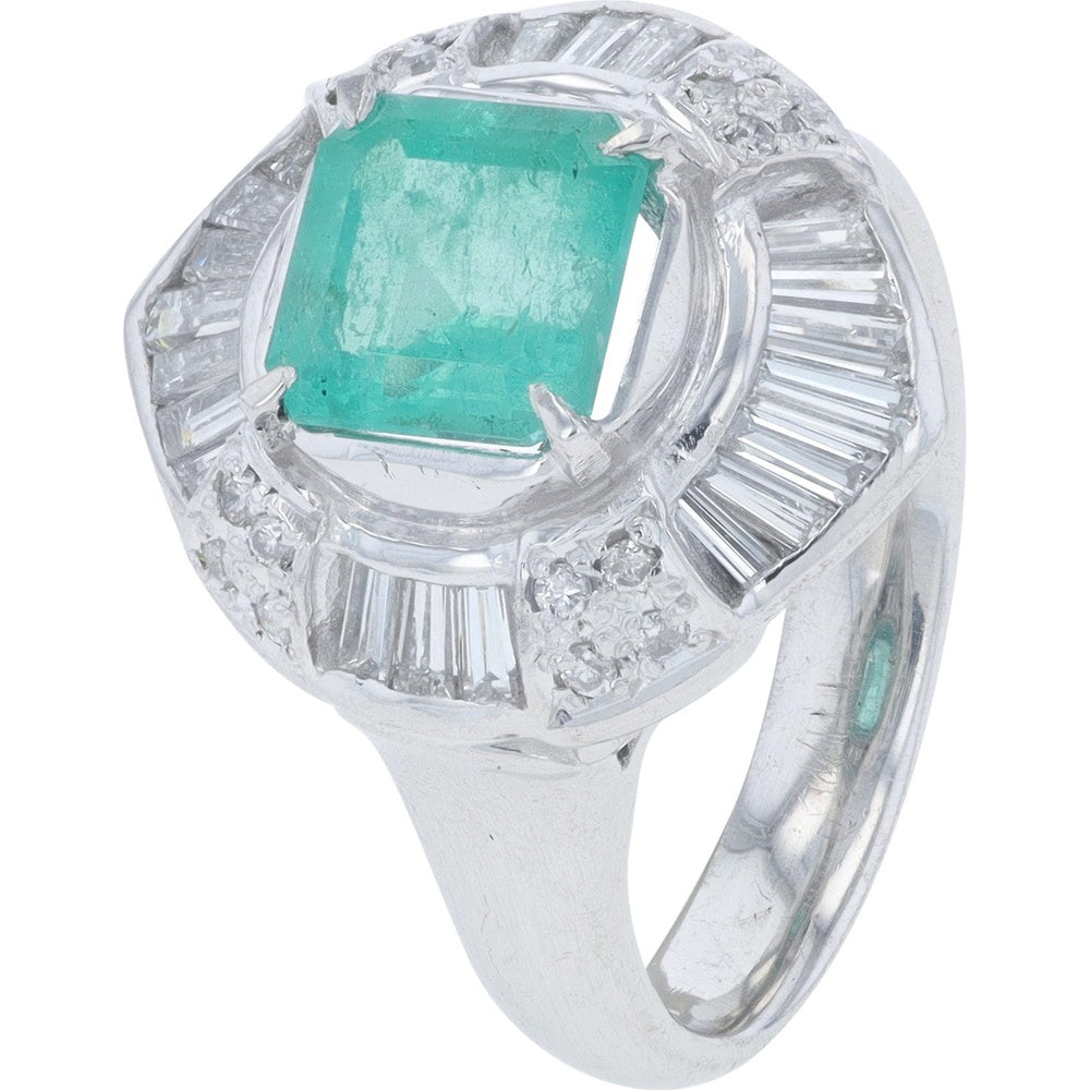 Platinum Geometric Halo Ring with 1.49 Carat Step-Cut Emerald and 0.68 Carat Baguette and Round Diamonds