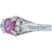 Platinum Geometric Ring with 0.72 Carat Oval Ruby and 0.05 Carat Round Diamond Accents