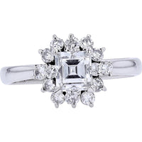 Platinum Halo Engagement Ring with 0.62 Carat Central Diamond and 0.93 Total Diamond Weight