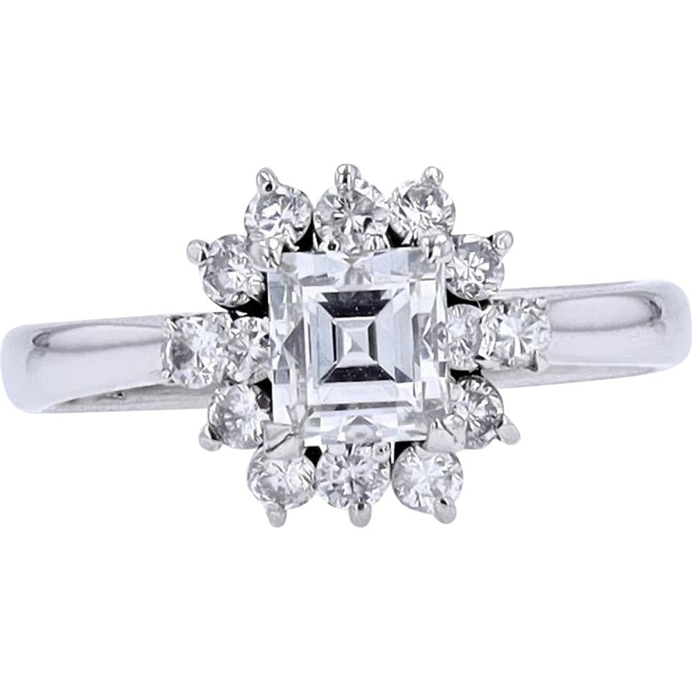 Platinum Halo Engagement Ring with 0.62 Carat Central Diamond and 0.93 Total Diamond Weight