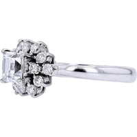 Platinum Halo Engagement Ring with 0.62 Carat Central Diamond and 0.93 Total Diamond Weight