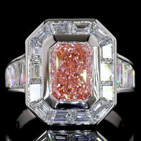 Platinum Halo Ring with 2.66 Carat Fancy Vivid Pink Radiant Cut Lab Diamond and Baguette Side Stones - 5.66 Carat Total Diamond Weight - Covaloro Fine Jewelry