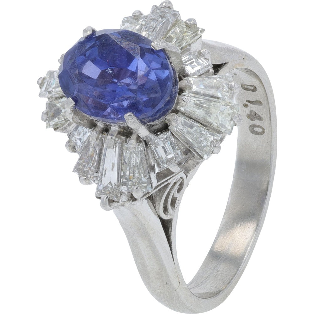 Platinum Halo Ring with 2.93 Carat No-Heat Oval Sapphire and 1.40 Carat Baguette Diamond Starburst Setting