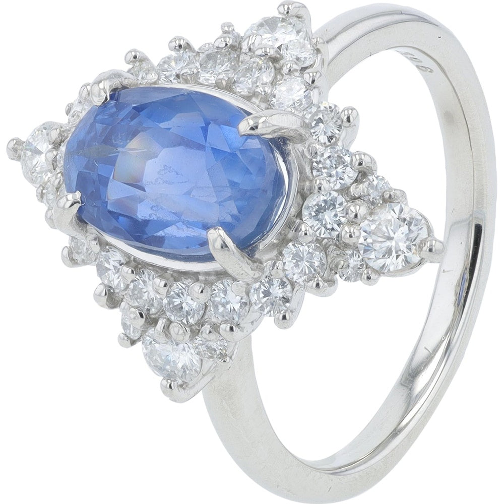 Platinum Halo Ring with 3.96 Carat No-Heat Oval Sri Lanka Sapphire and 0.81 Carat Diamond Accents
