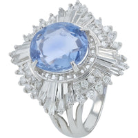 Platinum Halo Ring with 4.04 Carat Oval No-Heat Sri Lanka Sapphire and 0.60 Carat Baguette and Round Diamonds