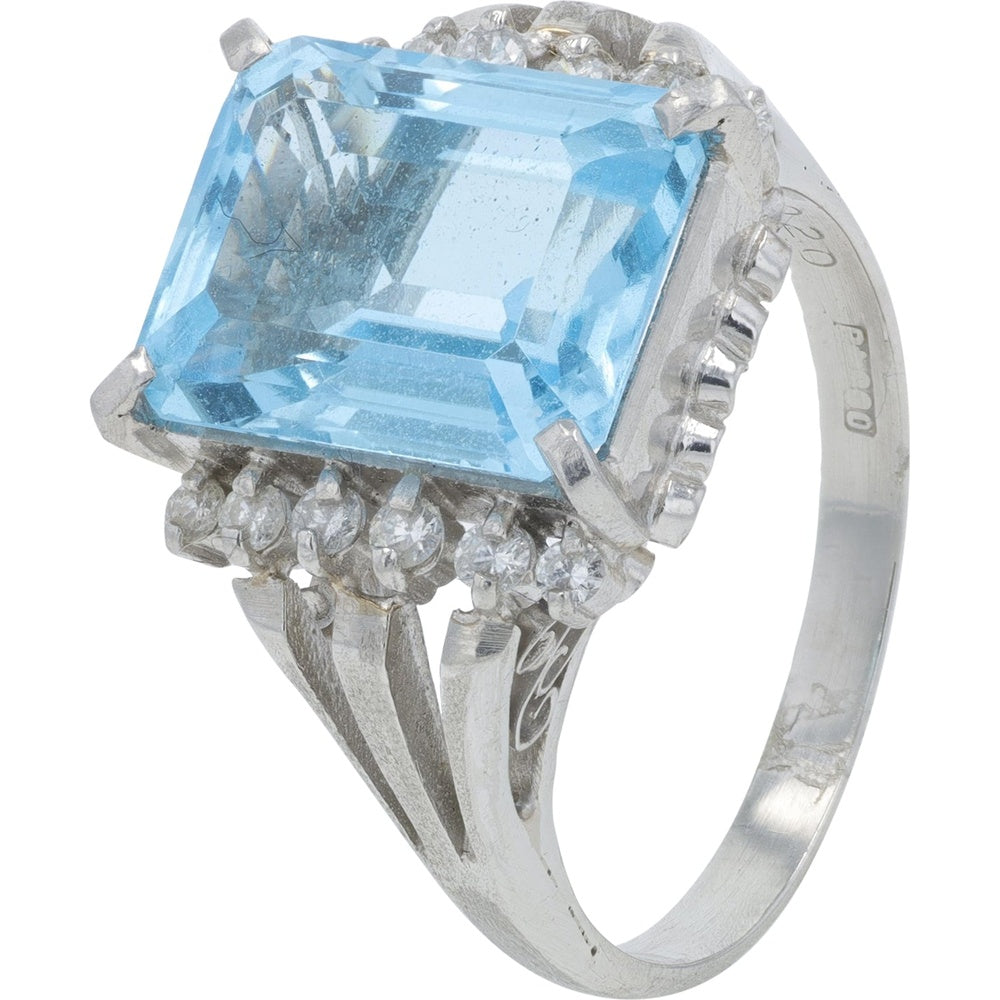 Platinum Halo Ring with Emerald-Cut Blue Topaz and Round Diamonds - 5.75 Carat Blue Topaz and 0.20 Carat Total Diamond Weight
