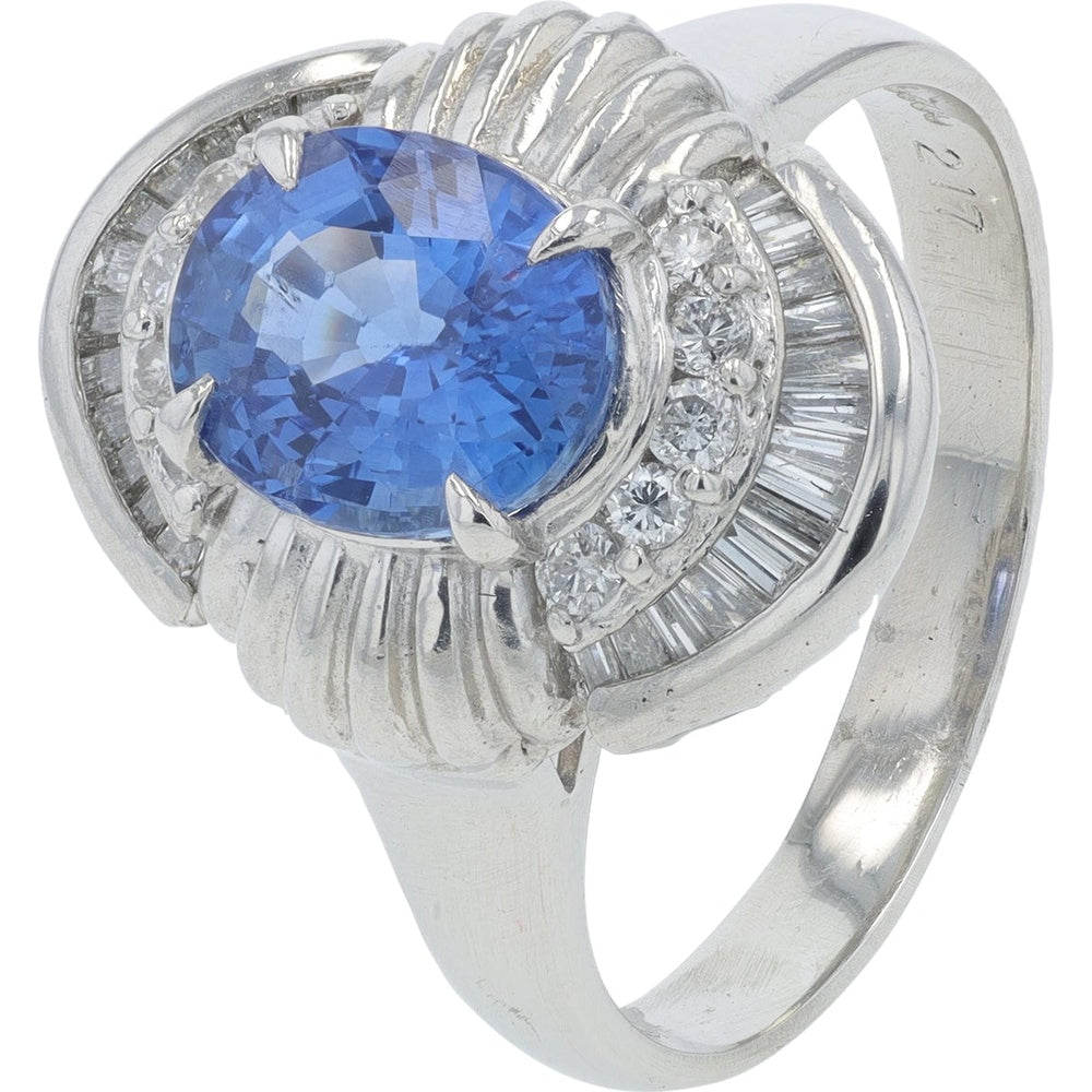 Platinum Halo Ring with Oval Sapphire and Baguette Diamonds - 2.17 Carat Total Sapphire Weight and 0.45 Carat Total Diamond Weight