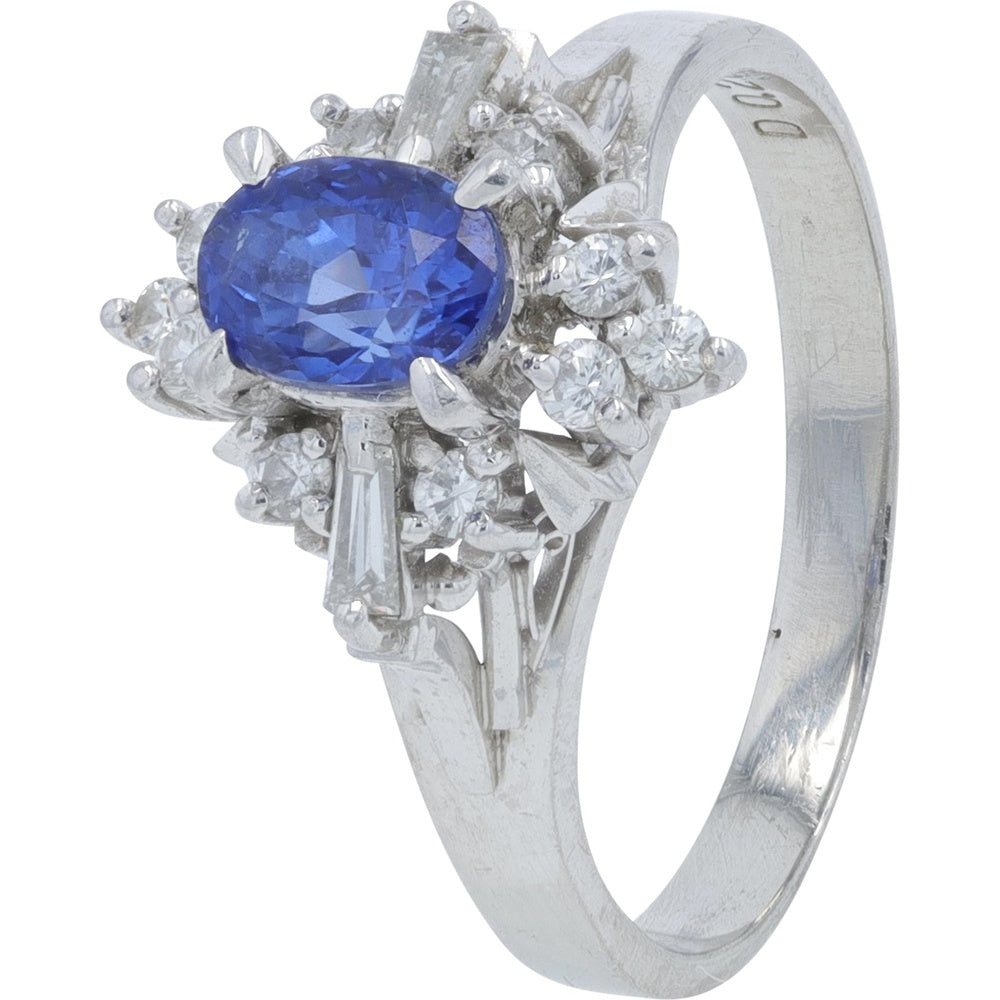 Platinum Halo Ring with Oval Sapphire and Mixed-Cut Diamond Accents - 0.73 Carat Sapphire and 0.20 Carat Total Diamond Weight