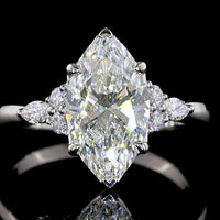 Platinum Marquise Cut Lab Diamond Ring with Side Stones - 2.75 Carat Total Weight, F VS1 Center - Covaloro Fine Jewelry