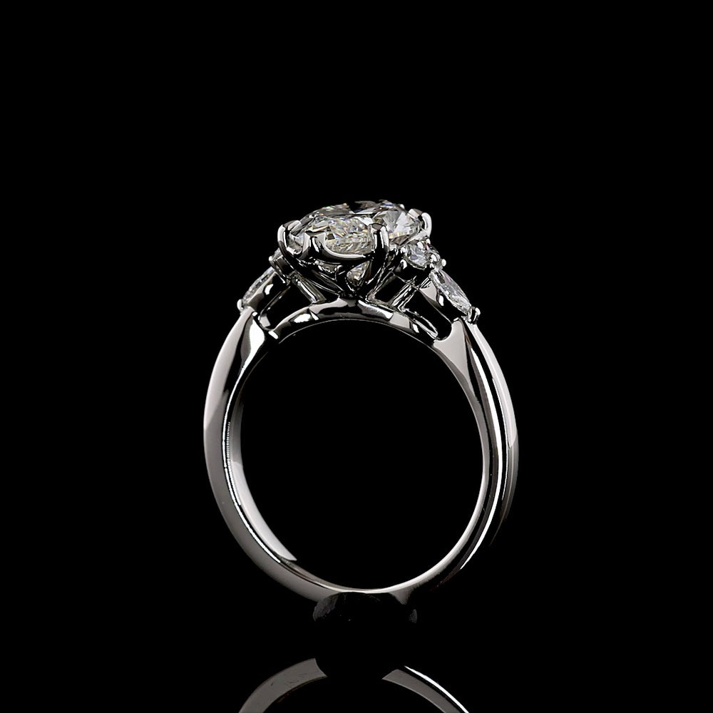 Platinum Marquise Cut Lab Diamond Ring with Side Stones - 2.75 Carat Total Weight, F VS1 Center - Covaloro Fine Jewelry