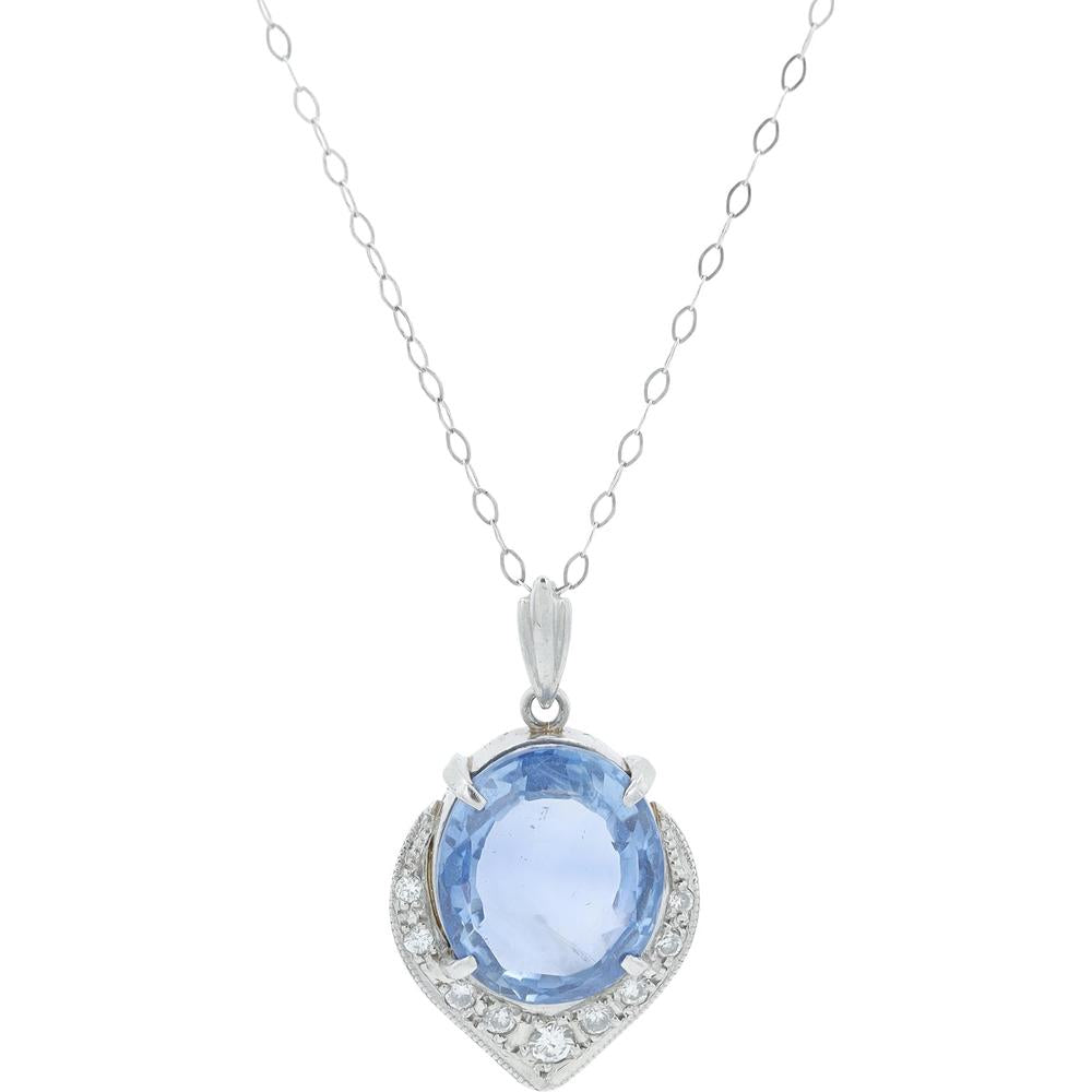Platinum Necklace with 9.648 Carat Oval Sapphire and 0.18 Carat Diamond Halo