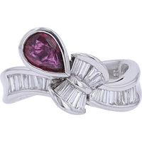 Platinum Ribbon-Style Ring with Pear-Shaped Ruby - 0.98 Carats and Baguette Diamonds - 0.65 Carats Total Diamond Weight