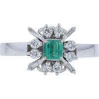Platinum Ring with 0.25 Carat Square Emerald and 0.24 Carats Total Diamond Weight