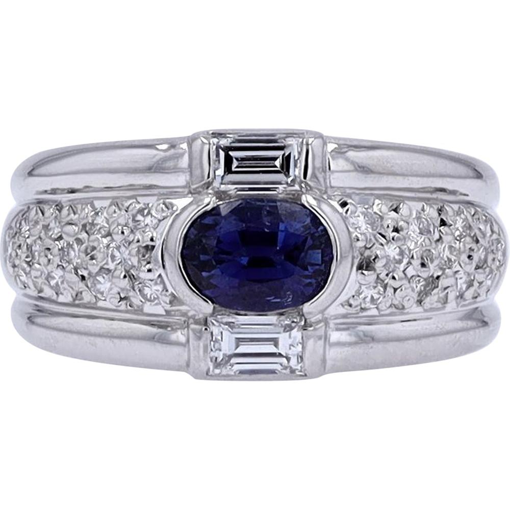 Platinum Ring with 0.90 Carat Oval Sapphire Center and 0.53 Carat Total Diamond Accents