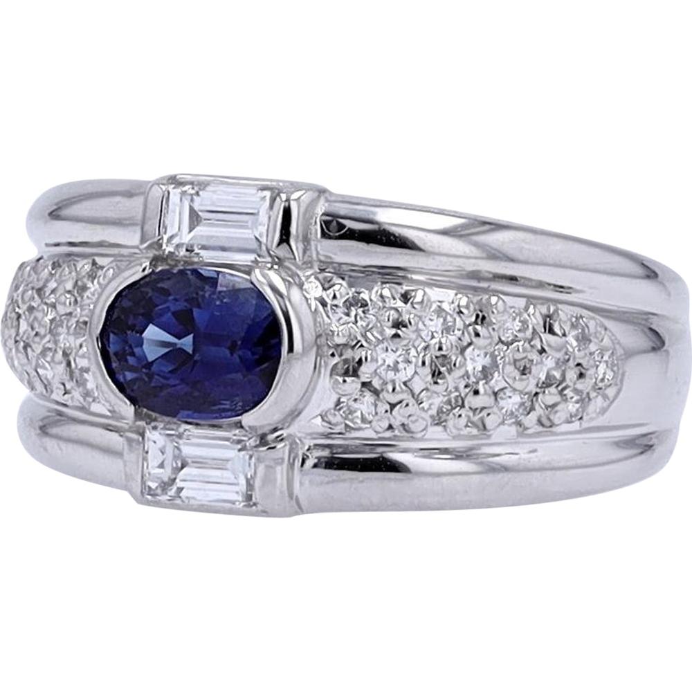 Platinum Ring with 0.90 Carat Oval Sapphire Center and 0.53 Carat Total Diamond Accents