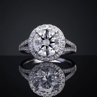 Platinum Split Shank Halo Ring with 4.07 Carat Round Brilliant Cut Lab Diamond and 0.79 Carat Additional Diamonds - 4.86 Carat Total Diamond Weight - Covaloro Fine Jewelry
