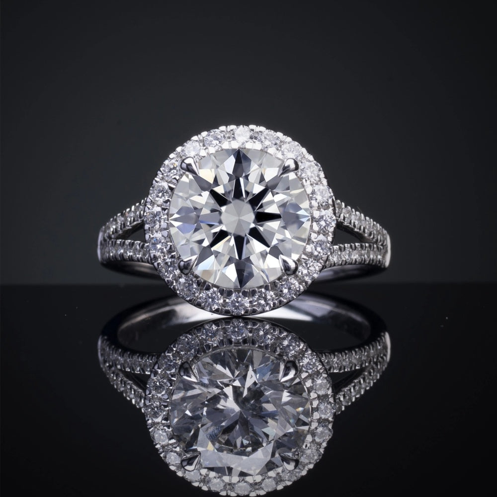 Platinum Split Shank Halo Ring with 4.07 Carat Round Brilliant Cut Lab Diamond and 0.79 Carat Additional Diamonds - 4.86 Carat Total Diamond Weight - Covaloro Fine Jewelry