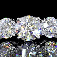 Platinum Three Stone Ring with 0.72 Carats Round E VVS2 Center Lab Diamond and 0.90 Carats D VVS2 Side Lab Diamonds - 1.62 Carats Total Diamond Weight - Covaloro Fine Jewelry