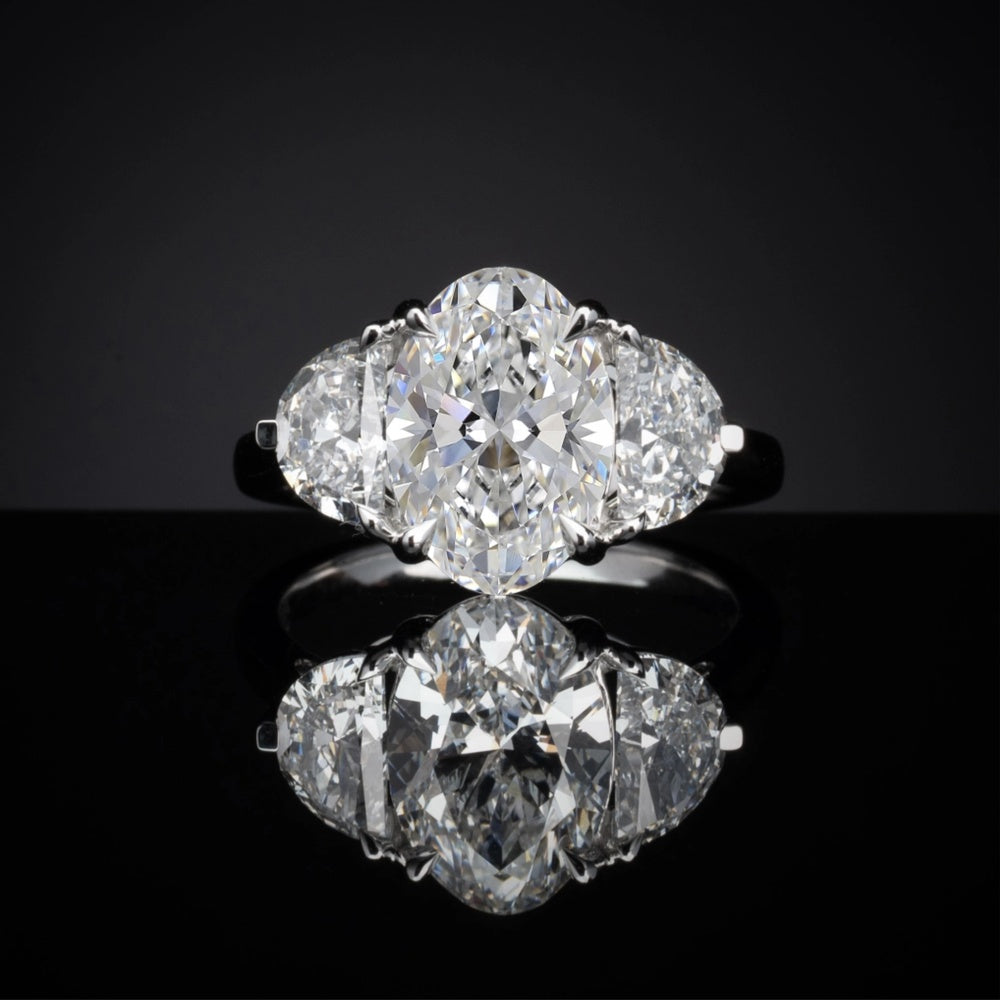 Platinum Three-Stone Ring with 2.09 Carat Oval Lab Diamond and 0.86 Carat Half-Moon Lab Diamonds - 2.95 Total Carat Weight - Covaloro Fine Jewelry