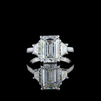 Platinum Three Stone Ring with 3.18 Carat Emerald Cut Lab Diamond and 1.07 Carat Trapezoid Cut Lab Diamonds - 4.25 Carat Total Weight - Covaloro Fine Jewelry