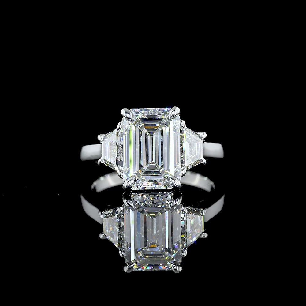 Platinum Three Stone Ring with 3.18 Carat Emerald Cut Lab Diamond and 1.07 Carat Trapezoid Cut Lab Diamonds - 4.25 Carat Total Weight - Covaloro Fine Jewelry