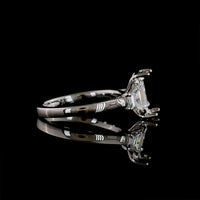 Platinum Three Stone Ring with Trapezoid Cut Lab Grown Diamonds - 0.64 Carat Total Weight, E-F VS1 Clarity - Covaloro Fine Jewelry