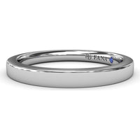 Polished Comfort Fit Wedding Band with Hidden Round Blue Sapphire Accent by Fana