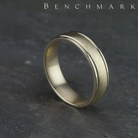 The Odyssey Men's Wedding Band in 14K Yellow Gold - 6.5mm by Benchmark