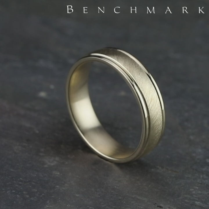 The Odyssey Men's Wedding Band in 14K Yellow Gold - 6.5mm by Benchmark