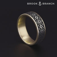 The Isle Men's Wedding Band in 14K Yellow Gold and Grey/Black Titanium - 7.5mm Width by Brook and Branch