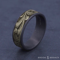 The Barrel Script Men's Wedding Band in Grey Tantalum and 14K Yellow Gold - 7.5mm Width by Brook and Branch