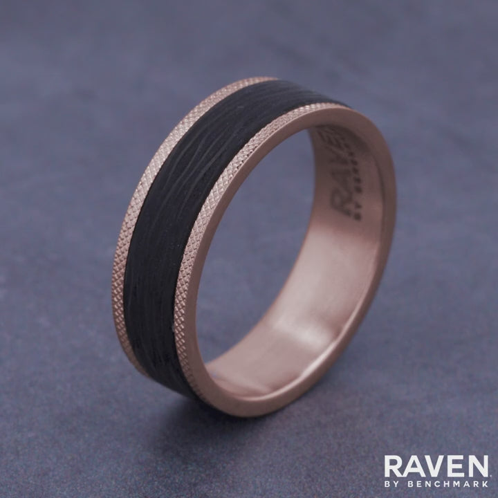 The Obsidian Men's Wedding Band in 14K Rose Gold and Forged Carbon Fiber - 7mm Width by Ammara Stone