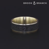 The Waterfowl Men's Wedding Band in 14K Yellow Gold and Black Titanium - 7.5mm Width by Brook and Branch