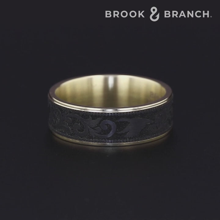 The Waterfowl Men's Wedding Band in 14K Yellow Gold and Black Titanium - 7.5mm Width by Brook and Branch