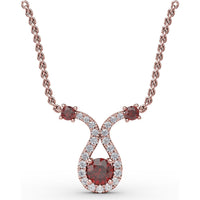 Ribbon Twist Pendant with Round Ruby and Pavé Diamond Halo by Fana - 0.52 Carat Total Gemstone Weight