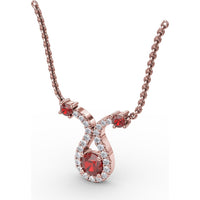 Ribbon Twist Pendant with Round Ruby and Pavé Diamond Halo by Fana - 0.52 Carat Total Gemstone Weight