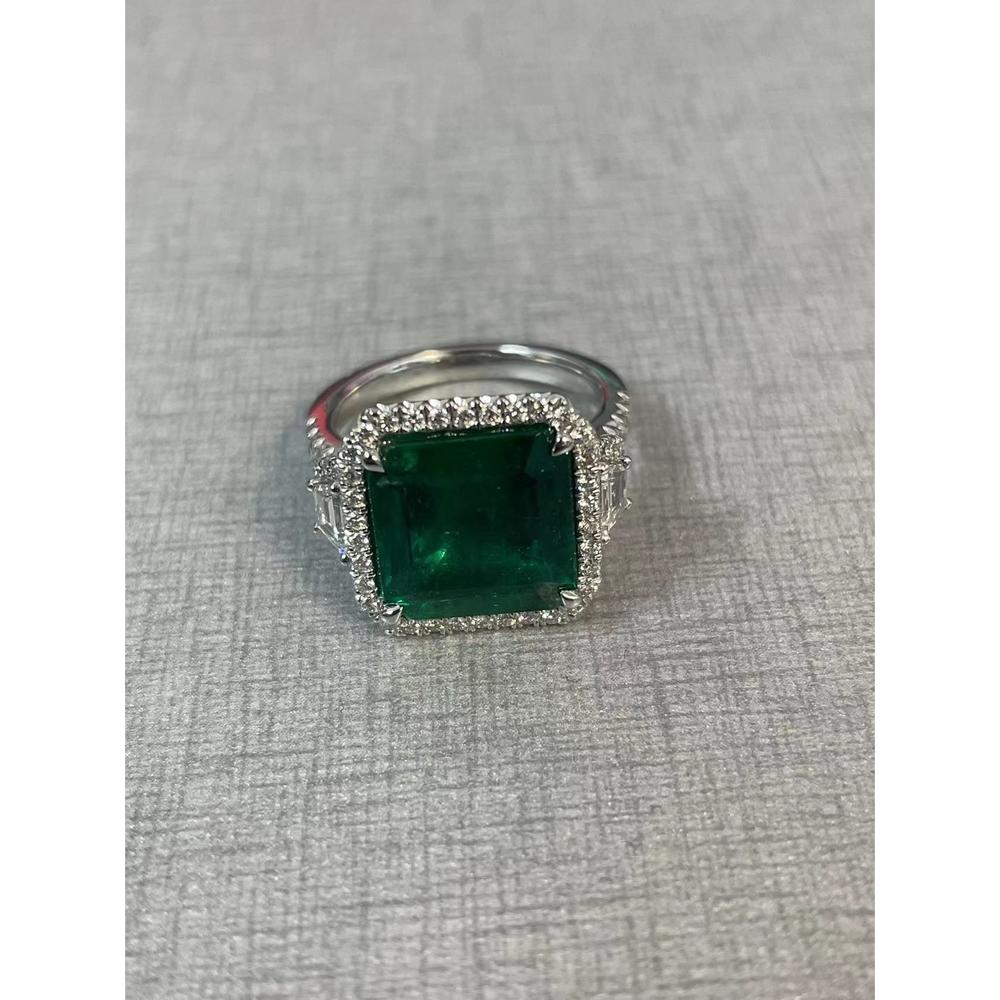 Roman & Jules - Platinum Ring with GIA-Certified 4.93 Carat Emerald Cut Emerald and 0.97 Carat Total Diamond Halo and Side Stones