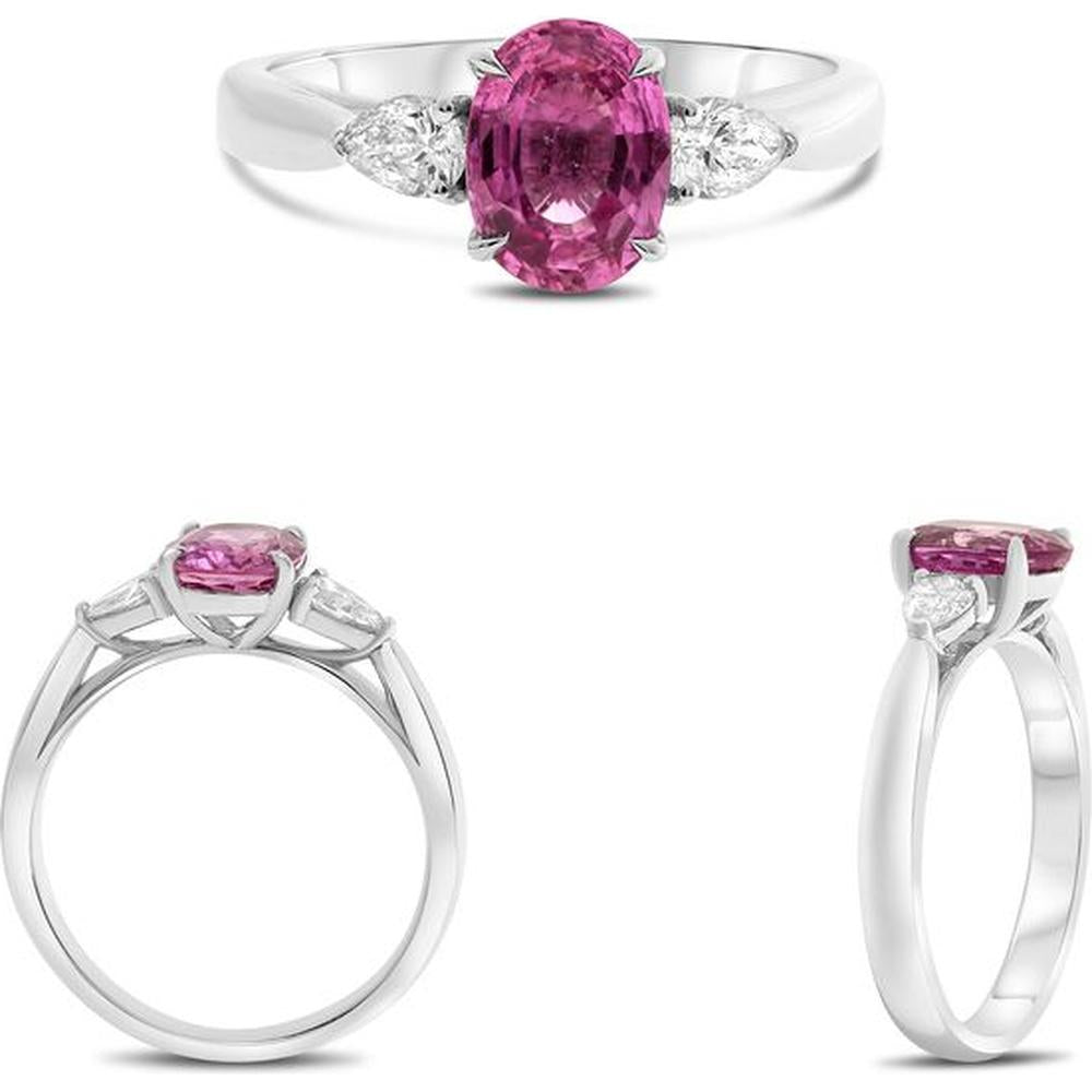 Roman & Jules - Platinum Three-Stone Ring with 1.47 Carat Oval Pink Sapphire and 0.28 Carat Pear-Shaped Diamonds