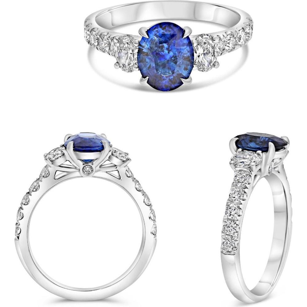 Roman & Jules - Platinum Three-Stone Ring with 1.77 Carat Oval Sapphire and 0.45 Carat Round and Oval Diamond Accents
