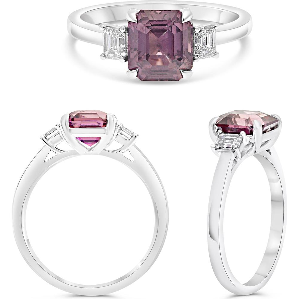 Roman & Jules - Platinum Three-Stone Ring with 2.48 Carat Emerald-Cut Pink Sapphire and 0.39 Carat Emerald-Cut Diamond Accents