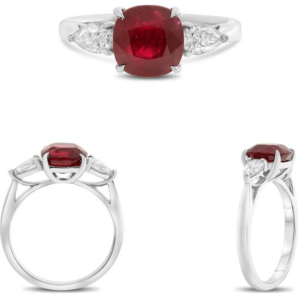 Roman & Jules - Platinum Three-Stone Ring with 2.84 Carat Cushion Ruby and 0.42 Carat Pear Diamond Accents