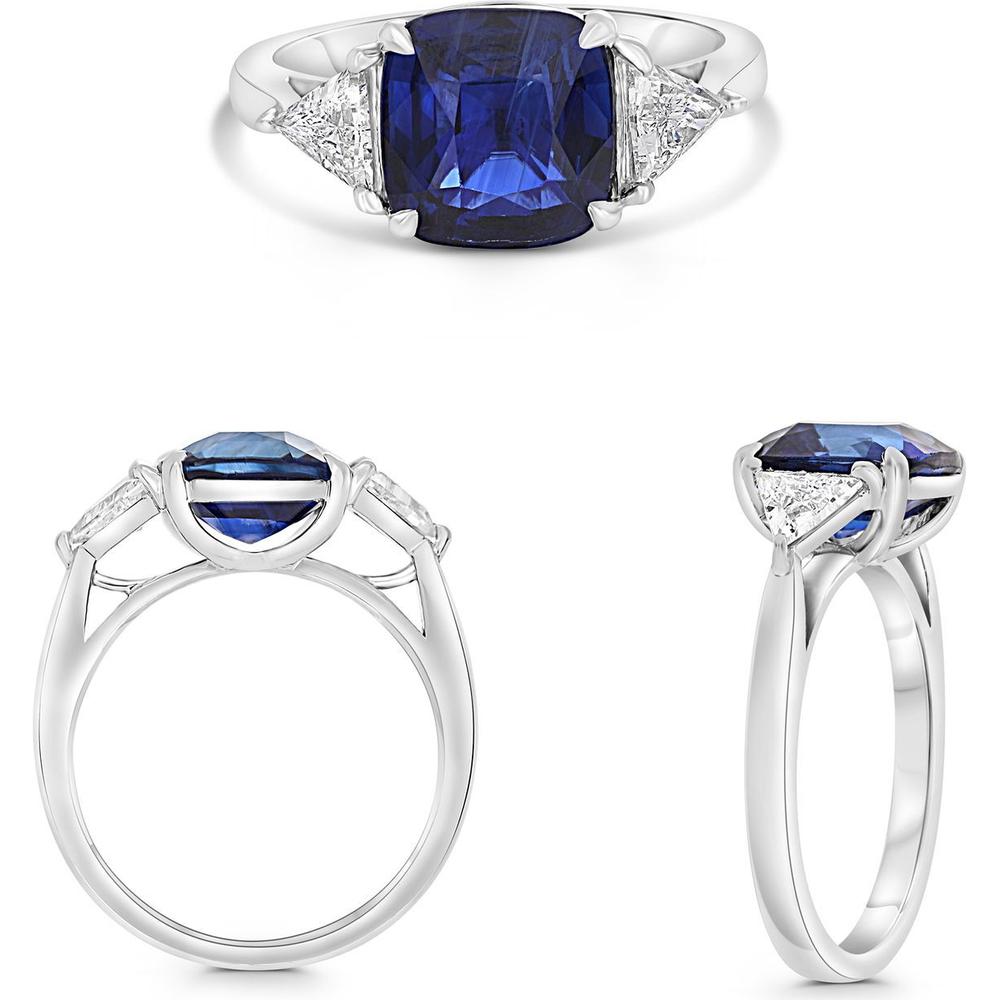 Roman & Jules - Platinum Three-Stone Ring with 4.07 Carat Cushion Sapphire and Trillion Diamond Accents