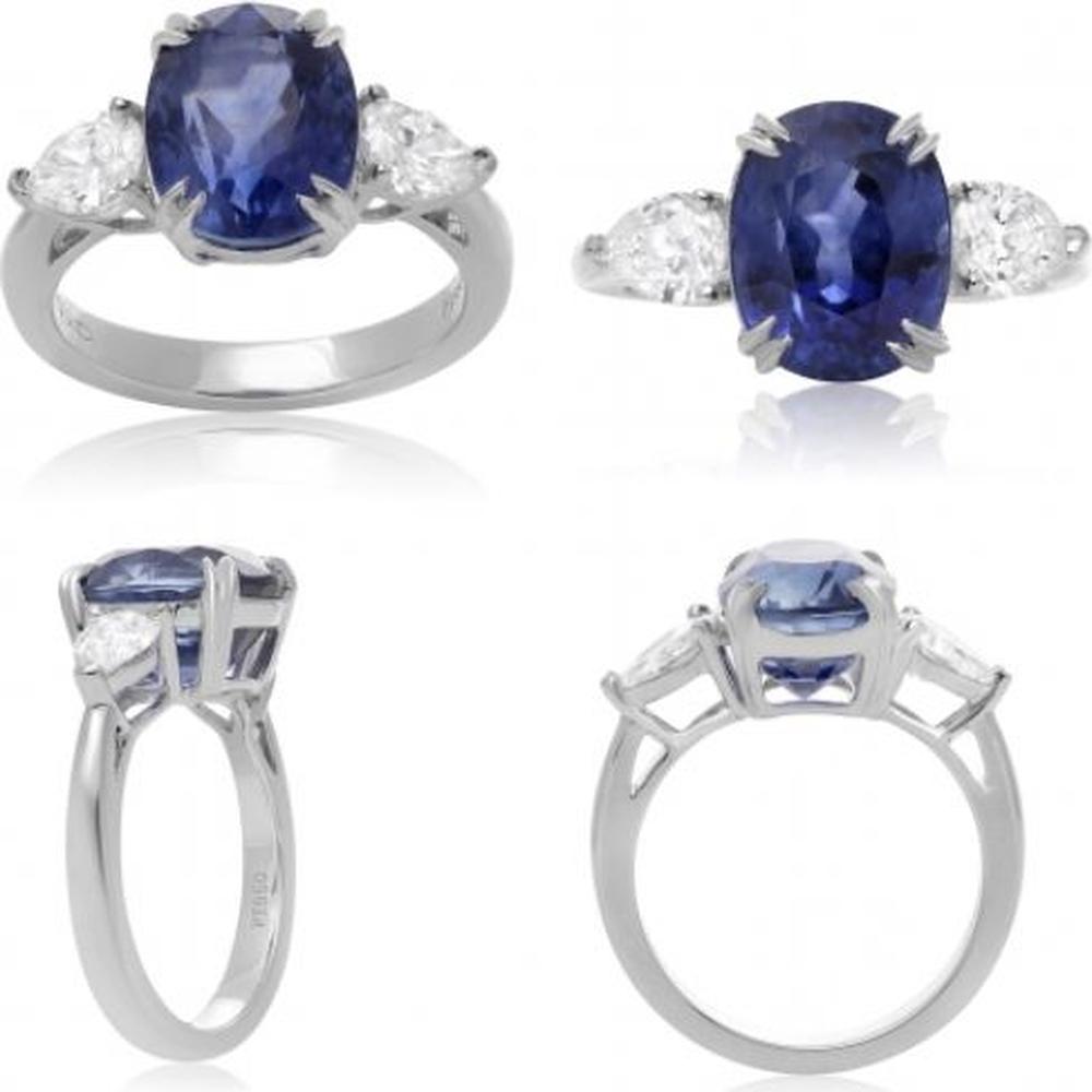 Roman & Jules - Platinum Three-Stone Ring with 6.14 Carat Oval Sapphire and 0.81 Carat Total Pear-Shaped Diamonds