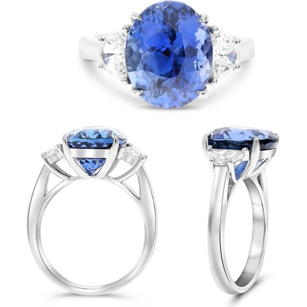Roman & Jules - Platinum Three-Stone Ring with 7.32 Carat Oval Sapphire and Triangular Diamond Accents