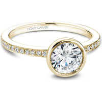 Round Brilliant Cut Diamond Engagement Ring with Bezel Setting and Pavé Band in Yellow Gold by Noam Carver<em> - Choose Your Center Diamond: 1 to 5 Carats, Sustainable Lab-Grown or Natural Earth-Mined</em>