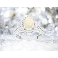 Royal 14K White Gold Opal and Diamond Split-Shank Halo Ring with 1.10 Carats Opal and 0.72 Carats Diamonds