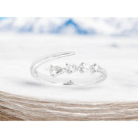 Royal 14K White Gold Open Ring with 0.25 Carat Pear-Shaped Diamonds