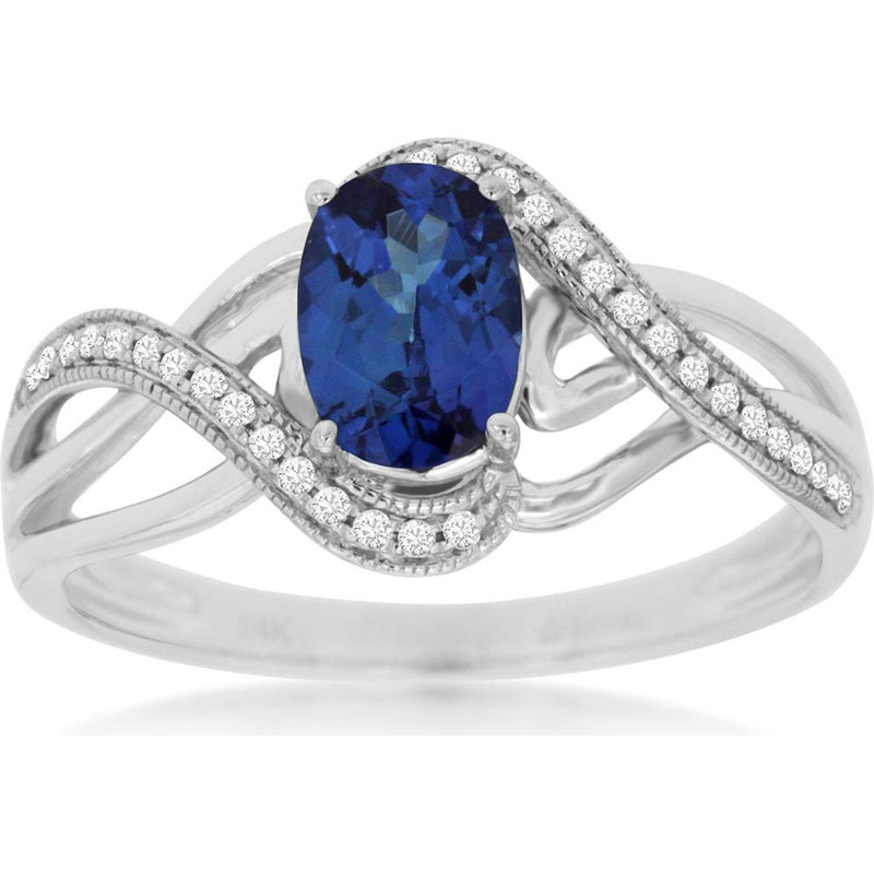 Royal 14K White Gold Ring with 0.85 Carat Oval Tanzanite and 0.10 Carat Diamond Accents