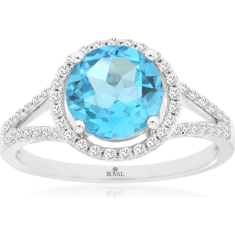 Royal 14K White Gold Ring with 2.2 Carat Oval Blue Topaz and 0.31 Carat Diamond Halo
